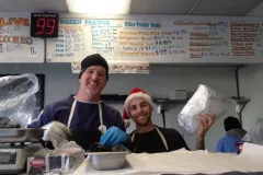 Owners Dan Strazzullo, Lynn Varesco, and Karen Lewis hanging out by the crab pot